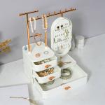 صندوق تخزين إكسسوارات ومكياج مع مرآة دوّارة - 12