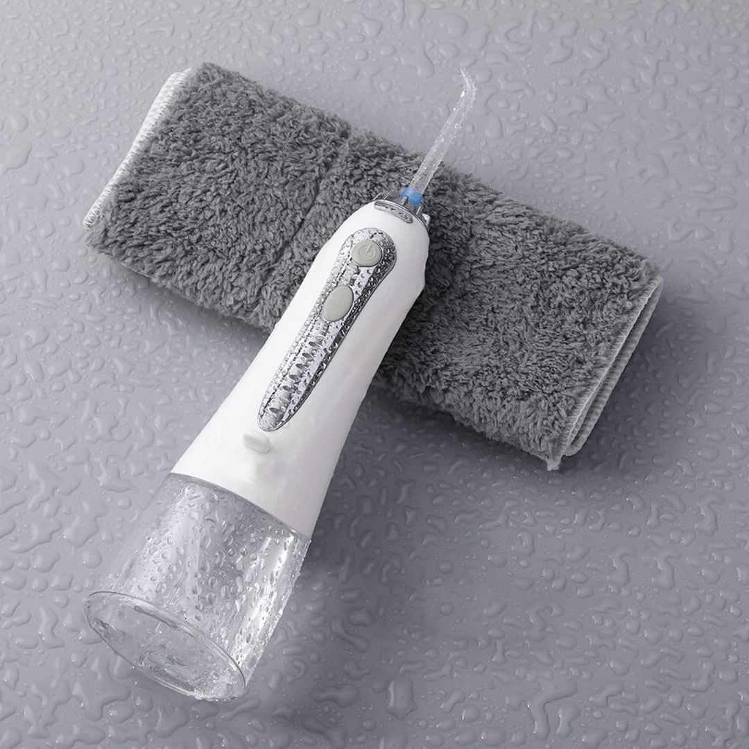 مضخة تنظيف الأسنان بضغط الماء - 19