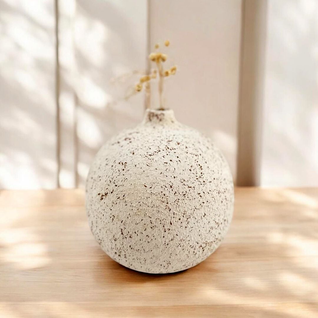 Small round ceramic vase