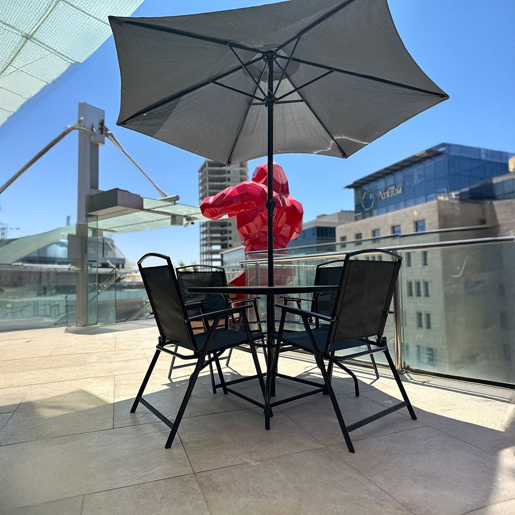 جلسة حديقة بأربعة كراسي ومظلة - 4