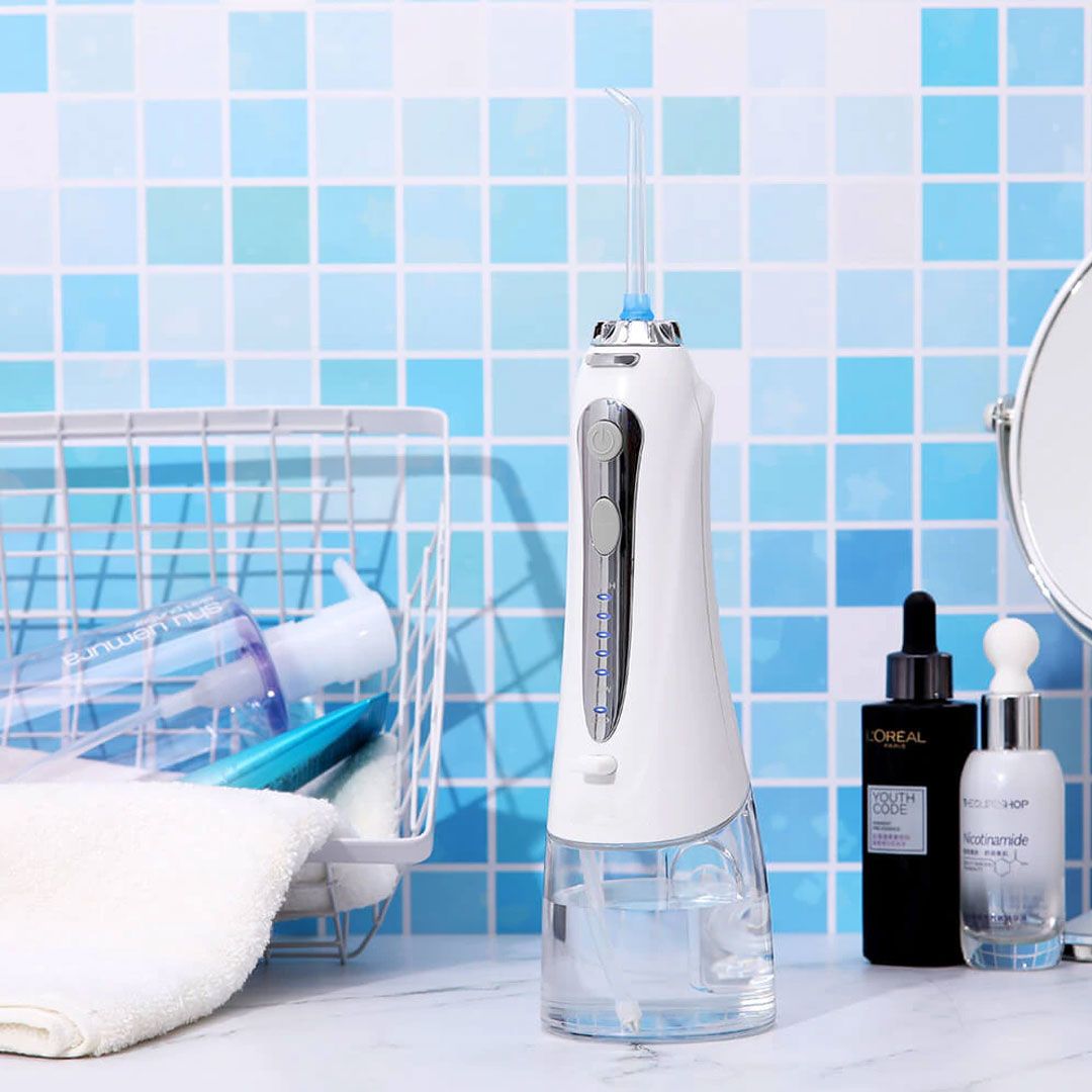 مضخة تنظيف الأسنان بضغط الماء - 1