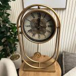 ساعة ديكورية بتصميم تروس و بندول ذهبي فاخر