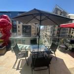 جلسة حديقة بأربعة كراسي ومظلة - 15