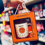 كوب بتصميم HERMES