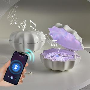 سبيكر  وبروجيكتور على شكل محار - 2