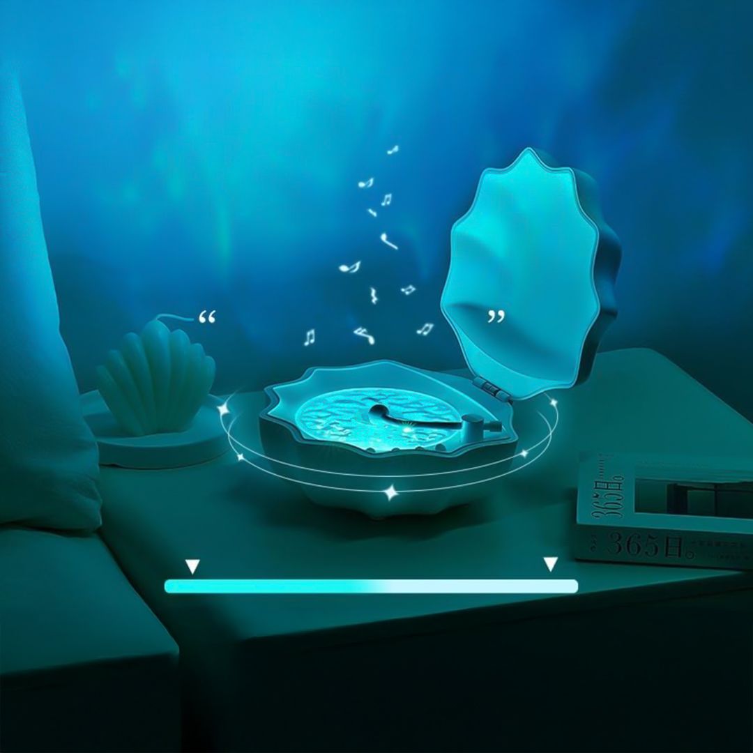 سبيكر  وبروجيكتور على شكل محار - 9