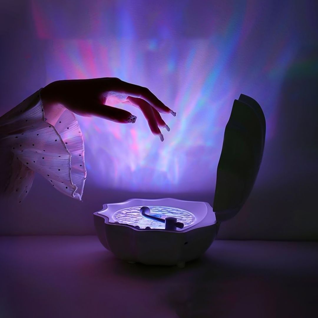 سبيكر  وبروجيكتور على شكل محار - 7