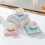 فنجان مع صحن بتصميم وسادة - 1